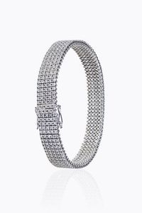 BRACCIALE - Peso gr 27 Lunghezza cm17 in oro bianco composto da cinque file di diamanti taglio brillante per totali ct 4 50  [..]