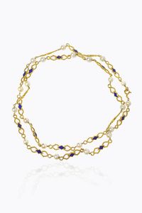 LUNGA COLLANA - Peso gr 30 8 Lunghezza cm 70 in oro giallo a maglia romboidale lavorata a corda con elementi in smalto blu  alternati  [..]