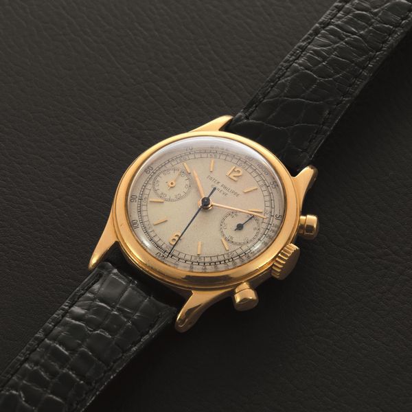 PATEK PHILIPPE - Rarissimo Tasti Tondi ref 1463 in oro giallo 18k con indici Index e numeri Arabi, due contatori quadrante Argent� Gren�.  - Asta Orologi da Polso e da Tasca - Associazione Nazionale - Case d'Asta italiane