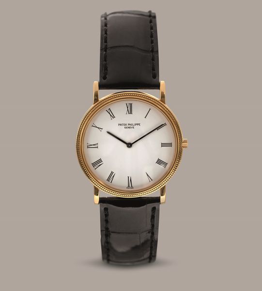 PATEK PHILIPPE - Elegante Calatrava Clos de Paris in oro giallo 18k, quadrante bianco con numeri Romani, carica manuale  - Asta Orologi da Polso e da Tasca - Associazione Nazionale - Case d'Asta italiane