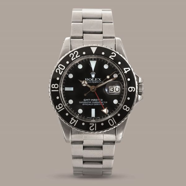 ROLEX - GMT MASTER ref 16750, in acciaio con ghiera girevole bidirezionale nera, quadrante nero al trizio datario e sfera delle 24 ore, carica automatica  - Asta Orologi da Polso e da Tasca - Associazione Nazionale - Case d'Asta italiane