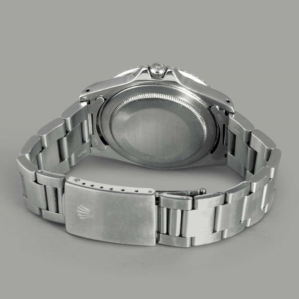 ROLEX - GMT MASTER ref 16750, in acciaio con ghiera girevole bidirezionale nera, quadrante nero al trizio datario e sfera delle 24 ore, carica automatica  - Asta Orologi da Polso e da Tasca - Associazione Nazionale - Case d'Asta italiane