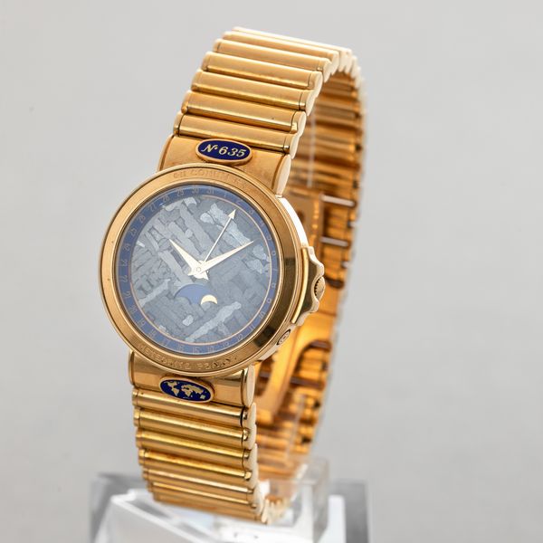CORUM - Meteorite in oro giallo 18k edizione numerata con funzione di datario e fasi lunari, quadrante in meteorite movimento automatico con scatola e garanzia  - Asta Orologi da Polso e da Tasca - Associazione Nazionale - Case d'Asta italiane