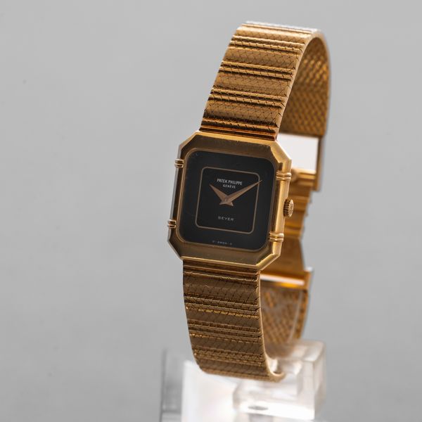PATEK PHILIPPE - ref 4457 Beyer in oro giallo 18k con bracciale integrato, quadrante nero bitonale accompagnato da Estratto d'Archivio  - Asta Orologi da Polso e da Tasca - Associazione Nazionale - Case d'Asta italiane