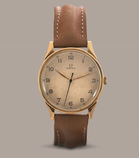 OMEGA - Orologio in oro 14k con anse riportate, quadrante champagne fan� con cifre Arabe, secondi centrali carica manuale  - Asta Orologi da Polso e da Tasca - Associazione Nazionale - Case d'Asta italiane