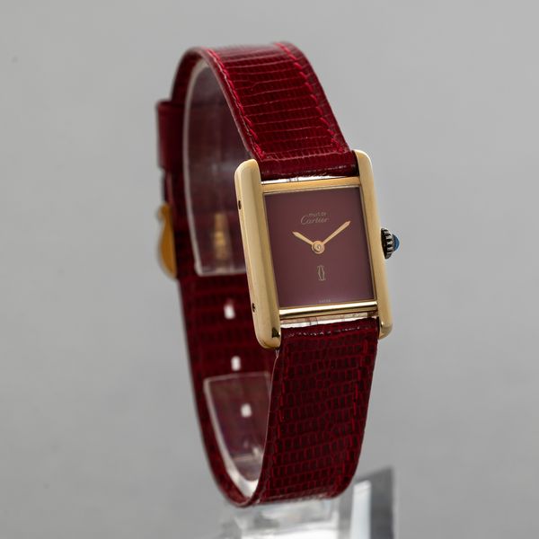 CARTIER - Must Vermeil in argento 925 laminato, quadrante bordeaux, carica manuale con scatola e garanzia  - Asta Orologi da Polso e da Tasca - Associazione Nazionale - Case d'Asta italiane