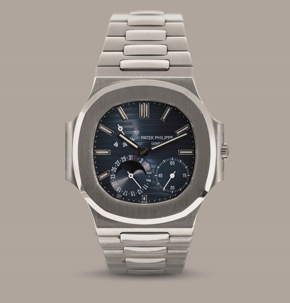 PATEK PHILIPPE - Nautilus ref 3712 in acciaio con fasi lunari riserva di carica a ore sette, funzione di calendario e fondello a vista con movimento automatico  - Asta Orologi da Polso e da Tasca - Associazione Nazionale - Case d'Asta italiane