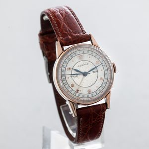 MOVADO - Triplo calendario in acciaio con lamina d'oro rosa su ghiera e anse, quadrante Argent� bitonale, numeri Arabi applicati, carica manuale  - Asta Orologi da Polso e da Tasca - Associazione Nazionale - Case d'Asta italiane