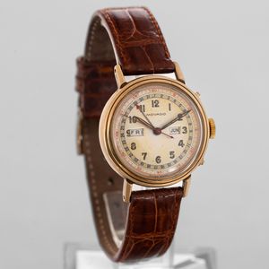 MOVADO - Orologio da polso in oro 14k, carica manuale con triplo calendario con quadrante fan� e fondello a vite  - Asta Orologi da Polso e da Tasca - Associazione Nazionale - Case d'Asta italiane