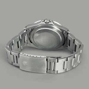 ROLEX - GMT MASTER ref 16750, in acciaio con ghiera girevole bidirezionale nera, quadrante nero al trizio datario e sfera delle 24 ore, carica automatica  - Asta Orologi da Polso e da Tasca - Associazione Nazionale - Case d'Asta italiane