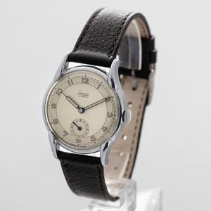 LANCO - Solo tempo carica manuale, anse ad 'Artiglio', quadrante Argent� con numeri Arabi e sfere luminose con tag originale  - Asta Orologi da Polso e da Tasca - Associazione Nazionale - Case d'Asta italiane