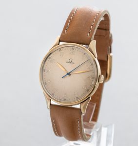 OMEGA - Orologio in oro 14k con anse riportate, quadrante champagne fan� con cifre Arabe, secondi centrali carica manuale  - Asta Orologi da Polso e da Tasca - Associazione Nazionale - Case d'Asta italiane