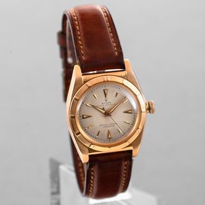 ROLEX - Ovetto ref 4777 in oro rosa 18k con ghiera lavorata, quadrante argento Gren� con inidici e sfere luminose, secondi centrali e movimento automatico  - Asta Orologi da Polso e da Tasca - Associazione Nazionale - Case d'Asta italiane