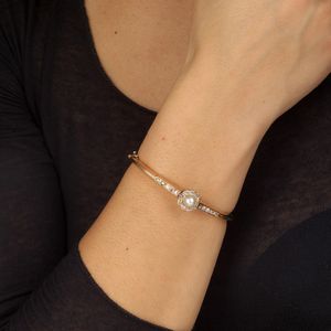 BRACCIALE RIGIDO CON PERLA E DIAMANTI  - Asta Gioielli - Associazione Nazionale - Case d'Asta italiane