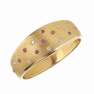 BRACCIALE RIGIDO CON SPILLA A FORMA DI FIORE  - Asta Gioielli - Associazione Nazionale - Case d'Asta italiane