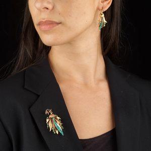 DEMI PARURE A FORMA DI TRALCI CON TURCHESI  - Asta Gioielli - Associazione Nazionale - Case d'Asta italiane