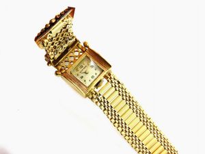 Bracciale/orologio per donna in oro giallo 14 kt  - Asta Asta 137 parte I - Gioielli e Orologi - Associazione Nazionale - Case d'Asta italiane