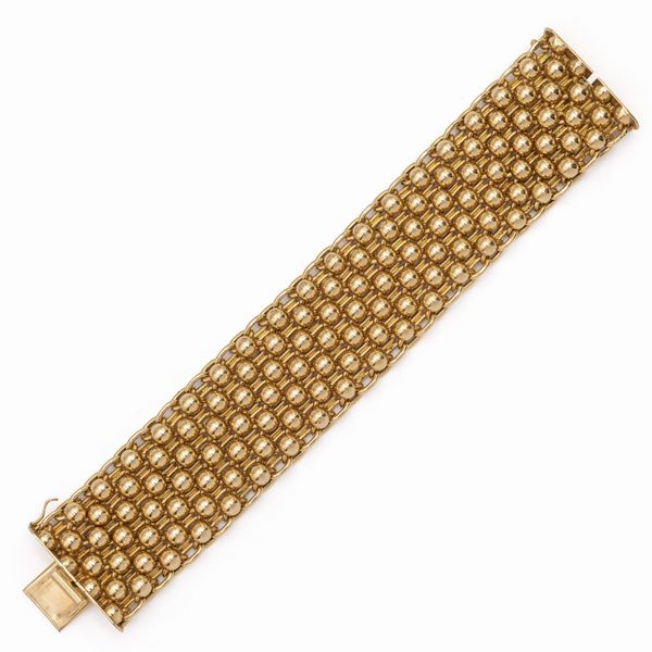 Bracciale a fascia in oro giallo 18kt  - Asta Gioielli Orologi e Fashion Vintage - Associazione Nazionale - Case d'Asta italiane