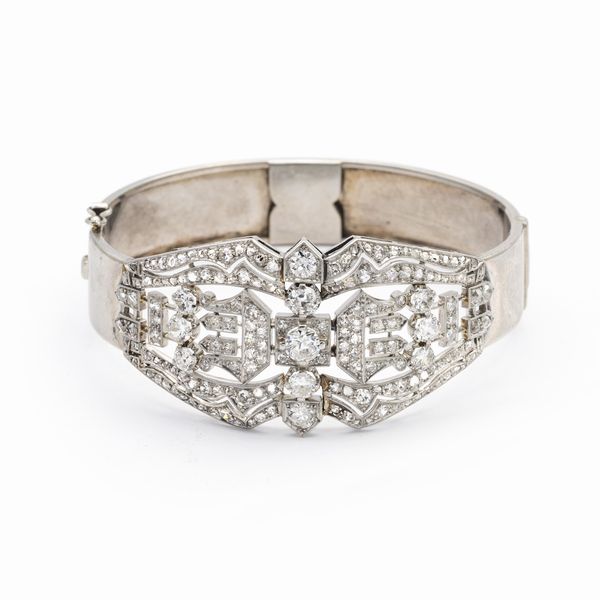 Bracciale Dec� a manetta in platino e diamanti  - Asta Gioielli Orologi e Fashion Vintage - Associazione Nazionale - Case d'Asta italiane