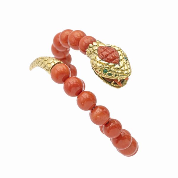 Bracciale serpente in oro giallo 18kt e corallo  - Asta Gioielli Orologi e Fashion Vintage - Associazione Nazionale - Case d'Asta italiane