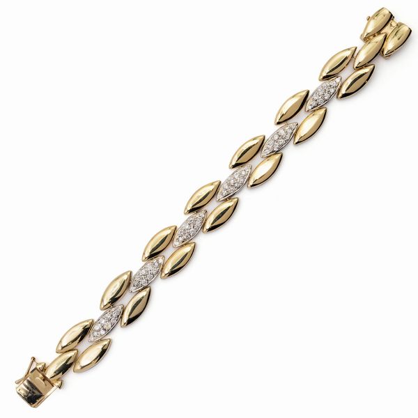 Bracciale in oro giallo e bianco 14kt e diamanti  - Asta Gioielli Orologi e Fashion Vintage - Associazione Nazionale - Case d'Asta italiane