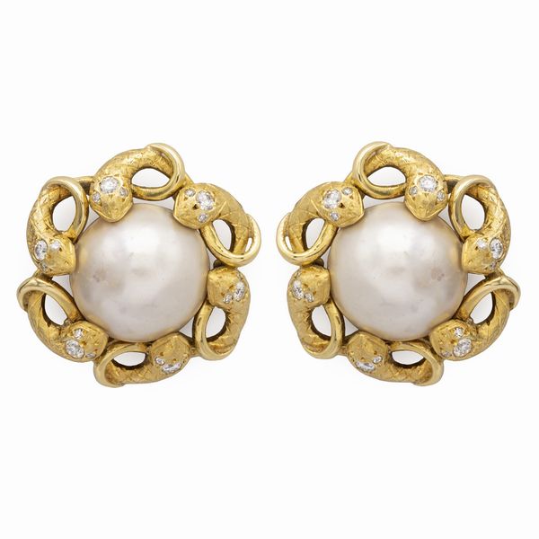 Orecchini serpenti a lobo in oro giallo 18kt  - Asta Gioielli Orologi e Fashion Vintage - Associazione Nazionale - Case d'Asta italiane