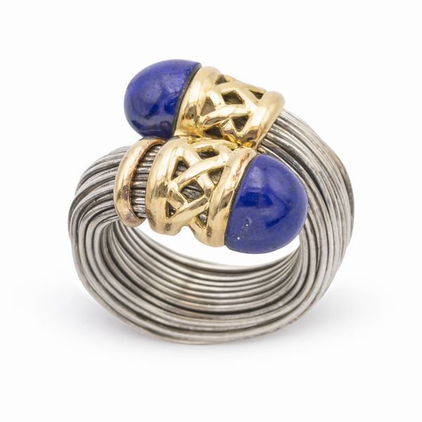 Anello contrari� in argento e oro giallo 18kt  - Asta Gioielli Orologi e Fashion Vintage - Associazione Nazionale - Case d'Asta italiane