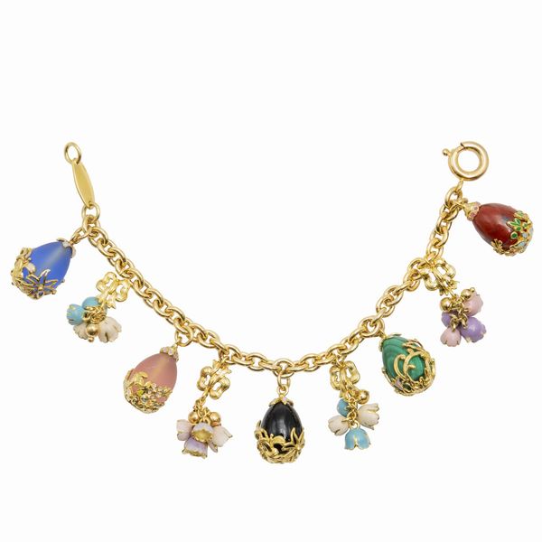 Bracciale charms in oro giallo 18kt  - Asta Gioielli Orologi e Fashion Vintage - Associazione Nazionale - Case d'Asta italiane