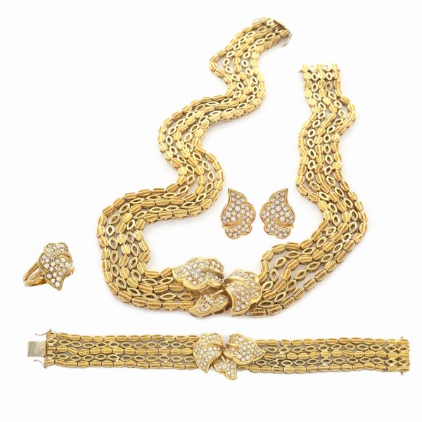 Parure foglie in oro giallo 18kt e diamanti  - Asta Gioielli Orologi e Fashion Vintage - Associazione Nazionale - Case d'Asta italiane