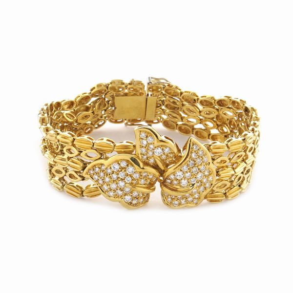 Parure foglie in oro giallo 18kt e diamanti  - Asta Gioielli Orologi e Fashion Vintage - Associazione Nazionale - Case d'Asta italiane