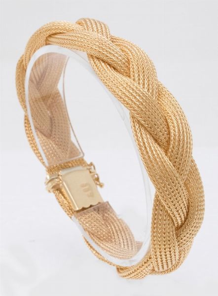 Bracciale in oro giallo a maglia intrecciata  - Asta Gioielli e Orologi - Associazione Nazionale - Case d'Asta italiane