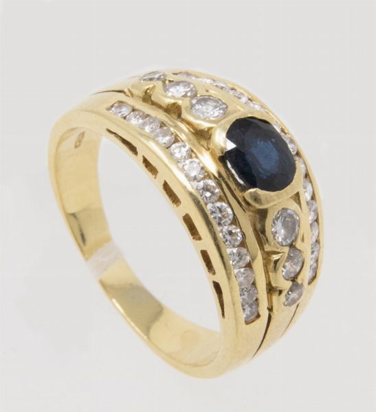 Anello a fascia in oro giallo con zaffiro e brillanti  - Asta Gioielli e Orologi - Associazione Nazionale - Case d'Asta italiane
