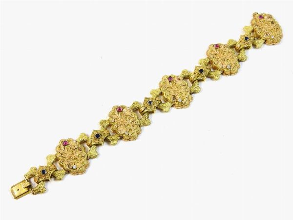 Bracciale in oro giallo e rosa, diamanti, rubini e zaffiri  - Asta Asta 137 parte II - Gioielli - Associazione Nazionale - Case d'Asta italiane