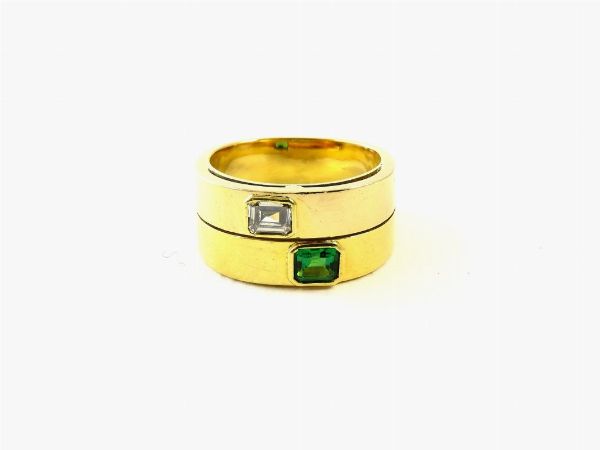 Anello a doppia fascia in oro giallo con diamante e smeraldo  - Asta Asta 137 parte II - Gioielli - Associazione Nazionale - Case d'Asta italiane