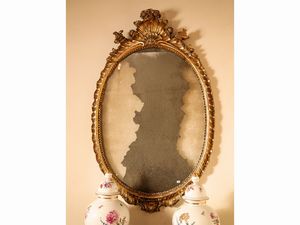 Coppia di cornici ovali in legno intagliato e dorato  - Asta Arredi e Dipinti dal Castello di Gamberaia a Firenze - Associazione Nazionale - Case d'Asta italiane