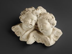 SCULTORE ITALIANO DEL XVII SECOLO - Coppia di cherubini in marmo scolpito