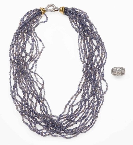 Lotto composto da una collana composta da pi fili di iolite ed un anello con  - Asta Gioielli - Associazione Nazionale - Case d'Asta italiane