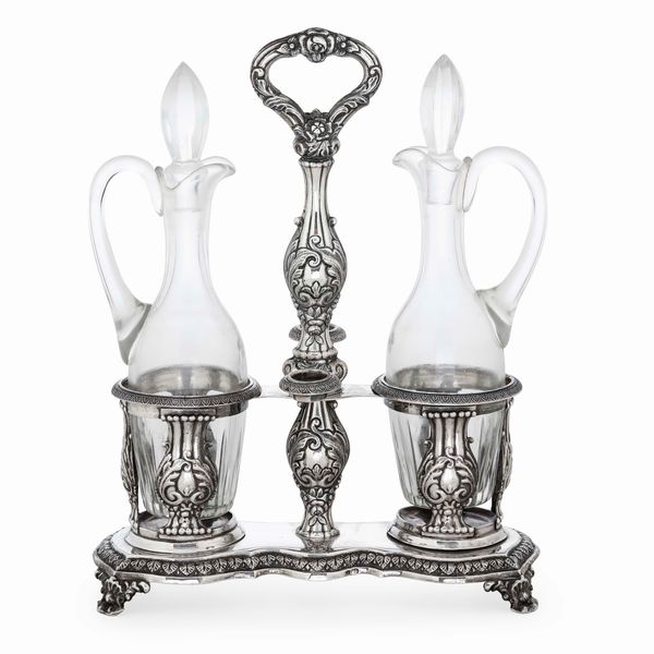 Acetoliera. Argento fuso e sagomato. Genova XIX secolo, marchi con delfino e croce mauriziana in uso dal 1825 al 1872  - Asta Argenti da Collezione | Antichi - Associazione Nazionale - Case d'Asta italiane