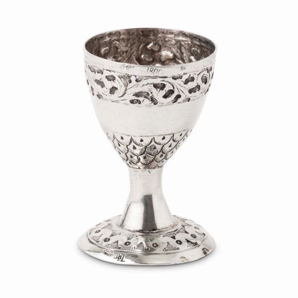 Bicchiere Kiddush. Argento fuso, sbalzato e cesellato. Bolli di Tripoli, 1930 circa  - Asta Argenti da collezione | XX secolo - Associazione Nazionale - Case d'Asta italiane