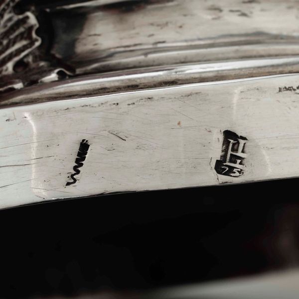 Coppia di candelieri. Argento fuso, sbalzato e cesellato. Genova XVIII secolo. Marchio della �Torretta� con datario 75  - Asta Argenti da collezione | XX secolo - Associazione Nazionale - Case d'Asta italiane