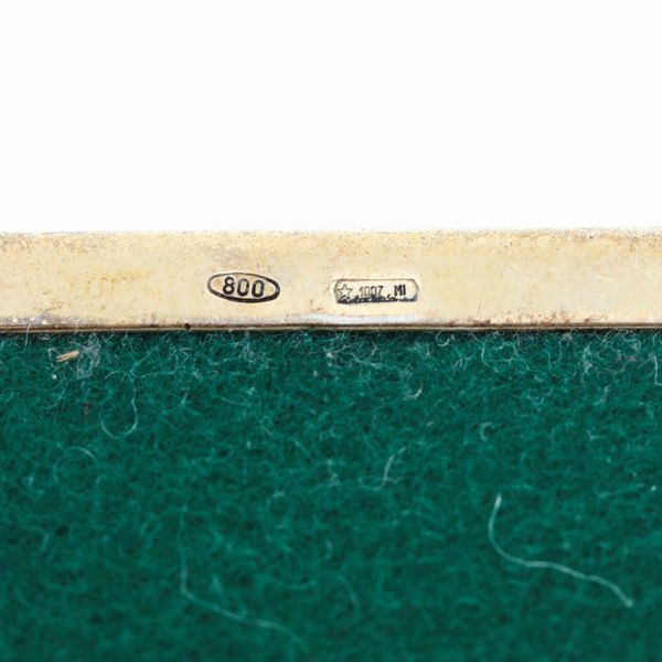 Taglialegna. Argento e argento dorato. Base in malachite. Argenteria artistica italiana del XX-XXI secolo  - Asta Argenti da collezione | XX secolo - Associazione Nazionale - Case d'Asta italiane