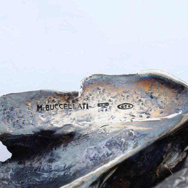 Elementi decorativi a foggia di nocciole e ghiande. Argento 925 fuso, sbalzato e cesellato. Maison Mario Buccellati, Milano XX secolo  - Asta Argenti da collezione | XX secolo - Associazione Nazionale - Case d'Asta italiane