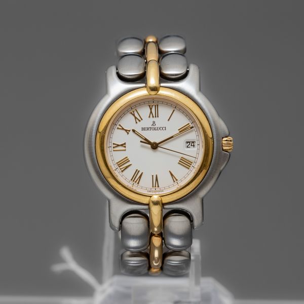 BERTOLUCCI - Pulchra , orologio acciaio e oro al quarzo con datario, quadrante bianco con numeri Romani  - Asta Orologi  - Associazione Nazionale - Case d'Asta italiane