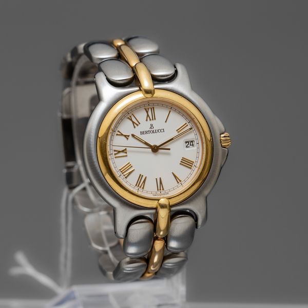 BERTOLUCCI - Pulchra , orologio acciaio e oro al quarzo con datario, quadrante bianco con numeri Romani  - Asta Orologi  - Associazione Nazionale - Case d'Asta italiane