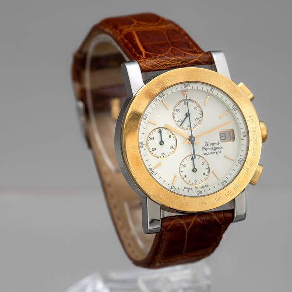GIRARD PERREGAUX -  Cronografo automatico acciaio e oro, contatori verticali con datario e lunetta tachimetrica  - Asta Orologi  - Associazione Nazionale - Case d'Asta italiane