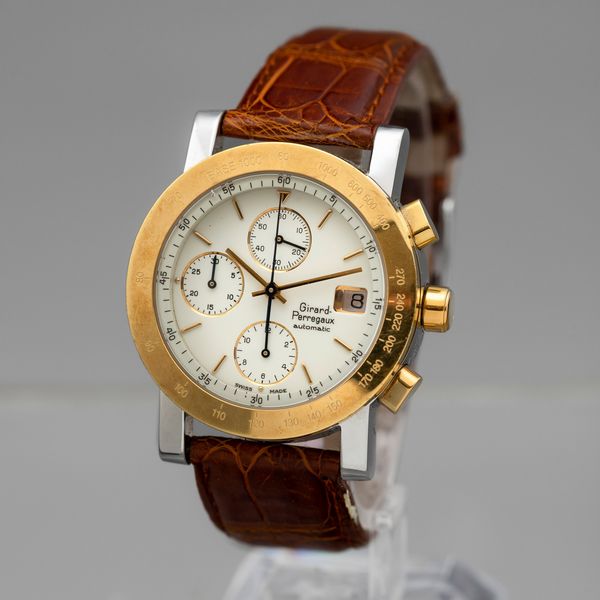 GIRARD PERREGAUX -  Cronografo automatico acciaio e oro, contatori verticali con datario e lunetta tachimetrica  - Asta Orologi  - Associazione Nazionale - Case d'Asta italiane