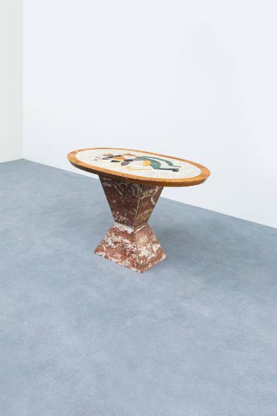 UMBERTO MASTROIANNI  su disegno di : Tavolo in marmo intarsiato con decoro realizzato dalla combinazione di marmi di diverse colorazioni. Realizzato dalla Ditta Craviolatti nella seconda met degli anni '60 cm 70x110x65 Si ringrazia il Prof. Floriano De Santi per le preziose informazioni  - Asta Design - Associazione Nazionale - Case d'Asta italiane