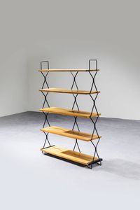 I.S.A - Libreria in legno chiaro  montanti in tubolare di ferro verniciato. Anni '50 Etichetta del Produttore cm 124 5x24  [..]