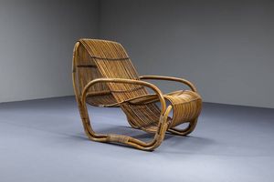 TRAVASA GIOVANNI  nello stile - Poltrona a forma geometrica con struttura in bamboo e canna dindia  legature in cuoio intrecciato. Anni '60 cm  [..]