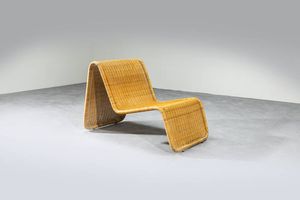 TITO AGNOLI - Poltrona con struttura in ferro e midollino. Anni '60 cm 68x100x60